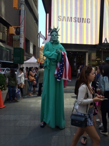 Lady Liberty stalks the tourists